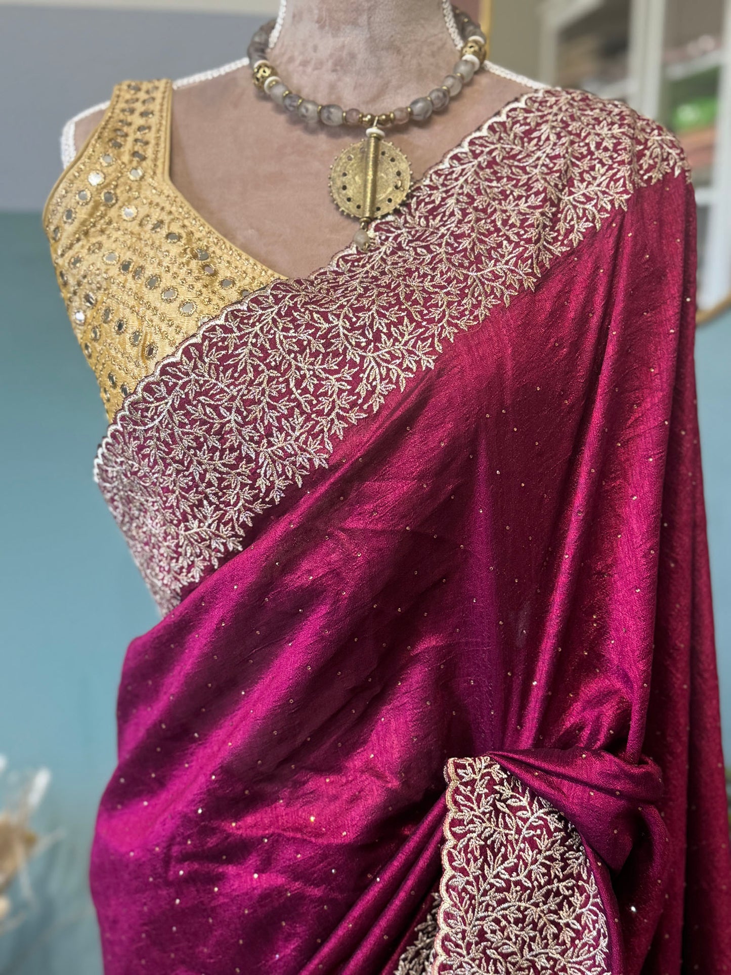 Wine Georgette Saree with Gold Zari Embroidery